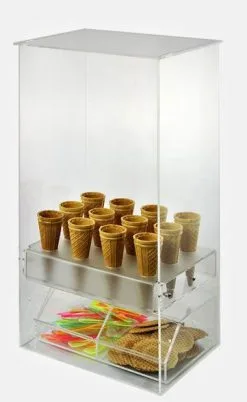 Portaconi In Plexiglas Trasparente Con Coperchio Mobile. È Dotato Di 12 Fori Per Coni Standard.